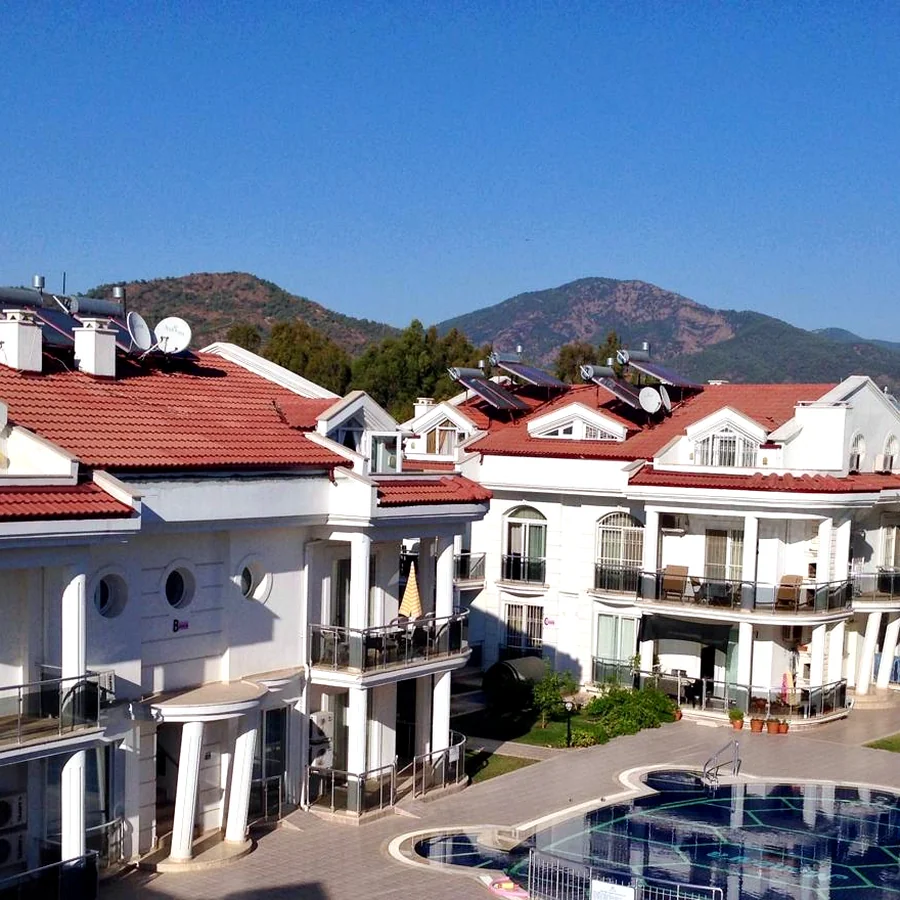 Pool and exterior view of the Calis Sunstay apartment complex